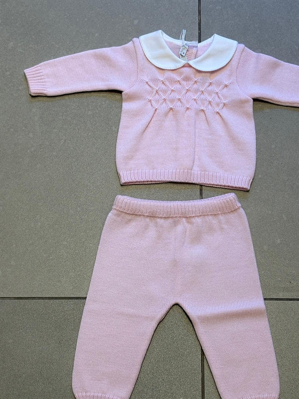 Completo due pezzi in lana rosa con punto smock