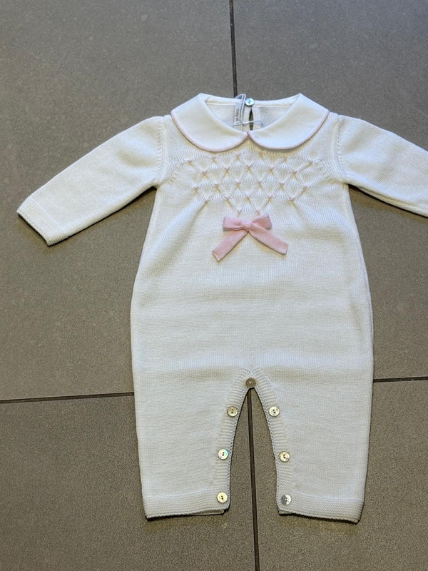 Tutina in lana panna con fiocco rosa e punto smock