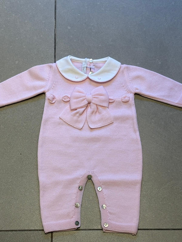Tutina in lana rosa con fiocco e cuoricini sul collo