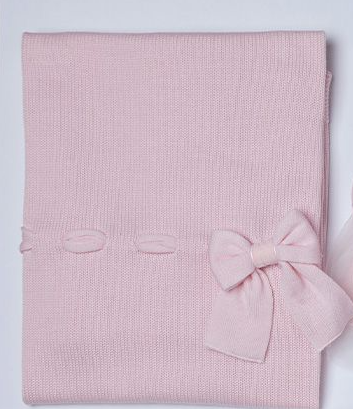 Coperta in lana rosa con fiocco