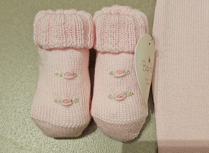 Scarpette in lana rosa ricamate
