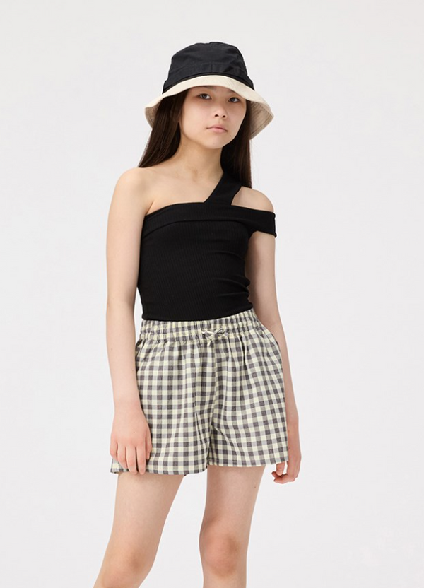 Pantaloncini larghi e fini con motivo a quadri bianco/nero