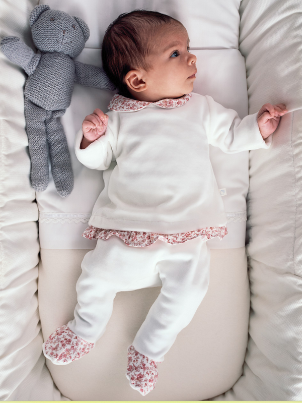 Tuta due pezzi con dettagli stampati a fiori