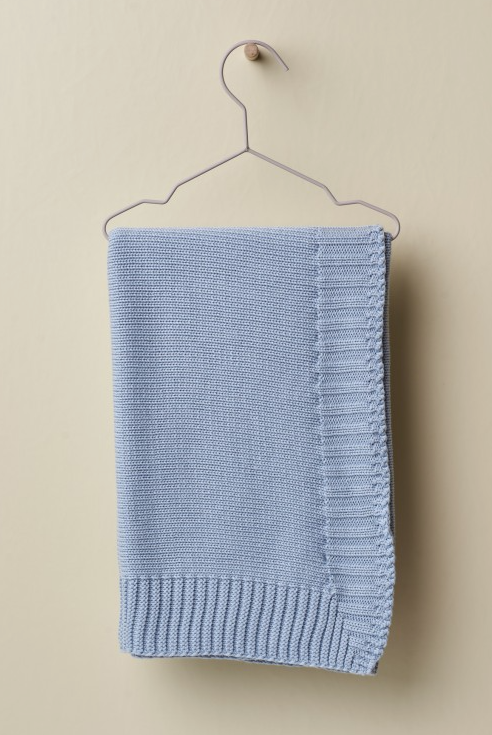 Coperta lavorata a maglia in lana merino