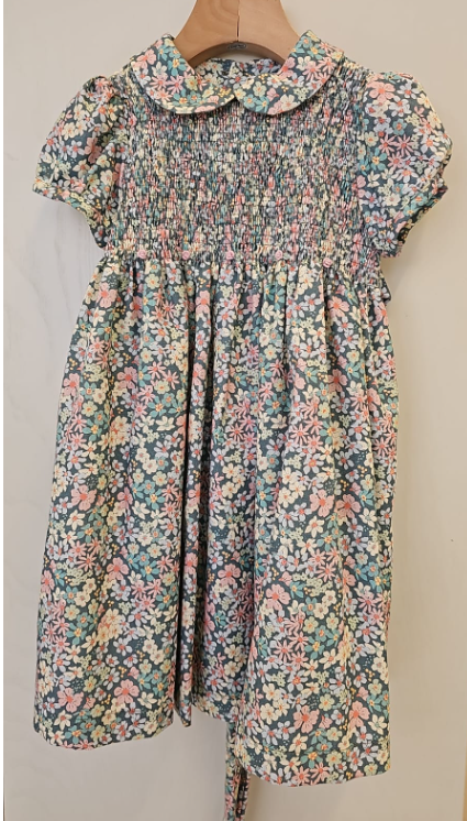 Abito in liberty con rose ricamate