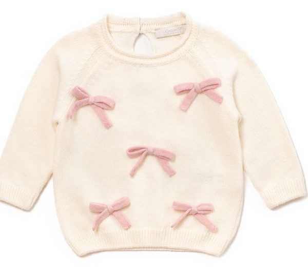 Maglione bianco con fiocchi rosa