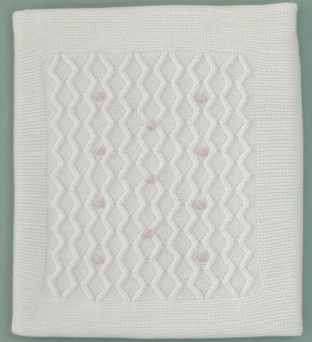 Coperta in lana fondo panna con roselline